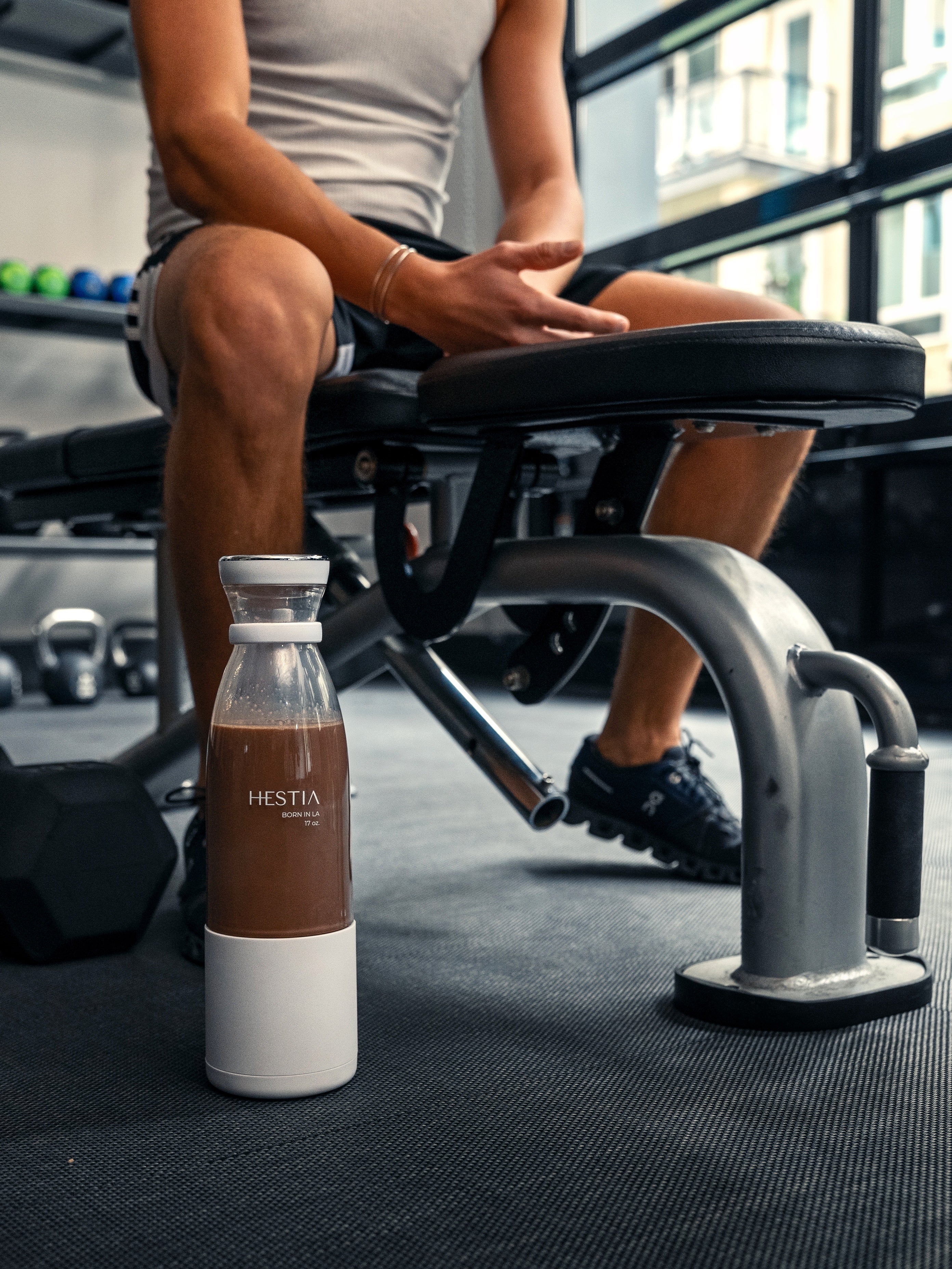 Male model with HESTIA portable blender at the gym